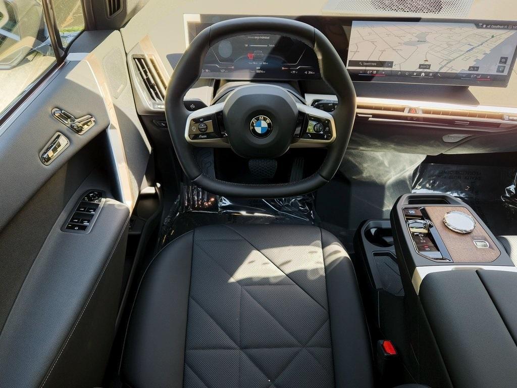 new 2026 BMW iX car, priced at $94,875