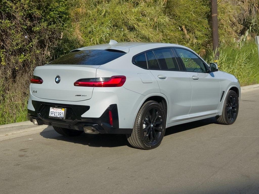 used 2025 BMW X4 car, priced at $58,995