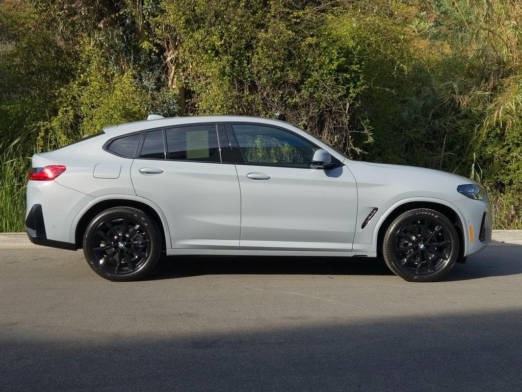 used 2025 BMW X4 car, priced at $58,995