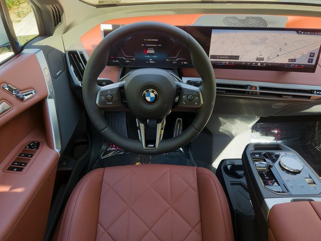 new 2026 BMW iX car, priced at $103,425