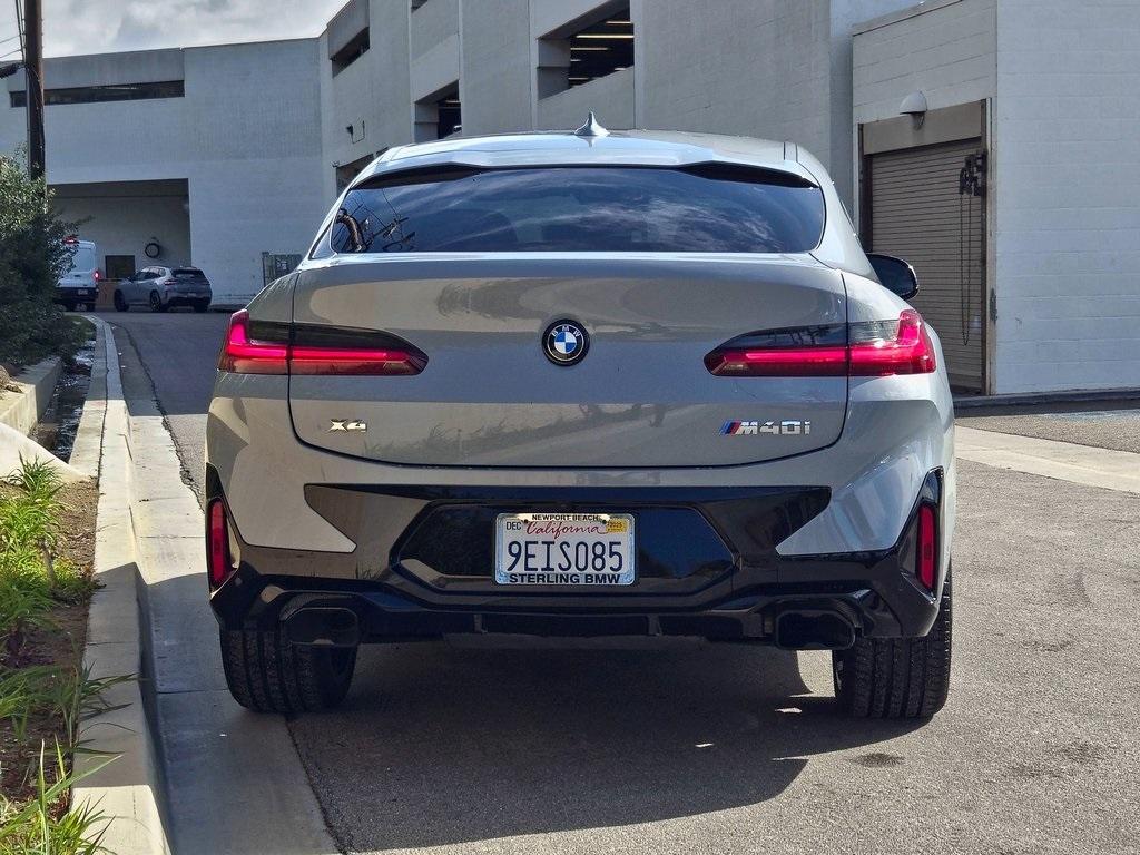 used 2023 BMW X4 car, priced at $58,995