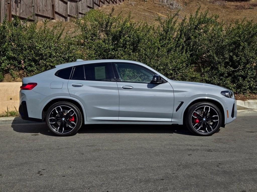 used 2023 BMW X4 car, priced at $58,995