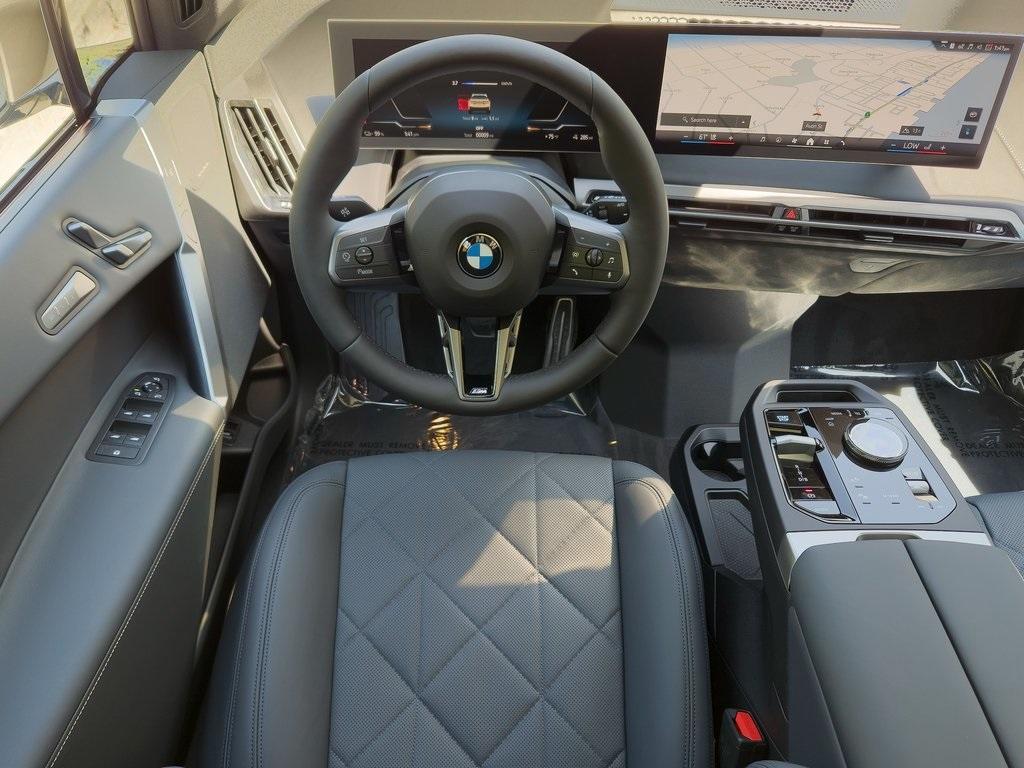 new 2026 BMW iX car, priced at $93,275