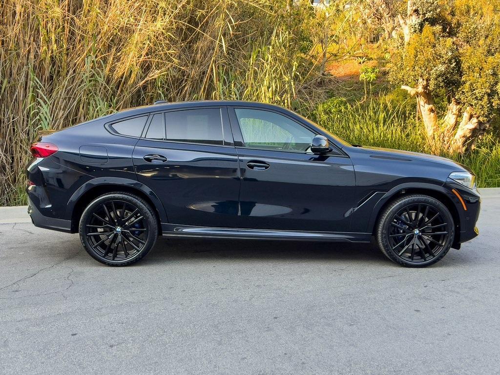 used 2022 BMW X6 car, priced at $55,995