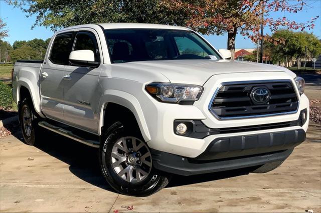 used 2018 Toyota Tacoma car, priced at $27,042