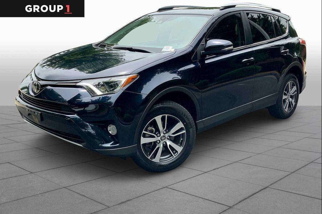 used 2018 Toyota RAV4 car, priced at $19,452