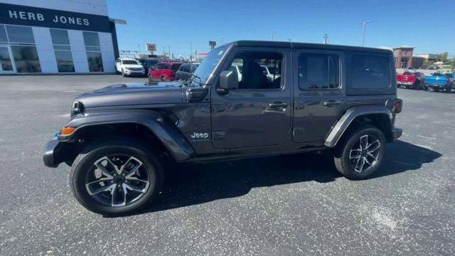 used 2024 Jeep Wrangler 4xe car, priced at $32,109
