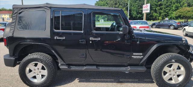 used 2011 Jeep Wrangler Unlimited car, priced at $12,950