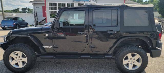 used 2011 Jeep Wrangler Unlimited car, priced at $12,950