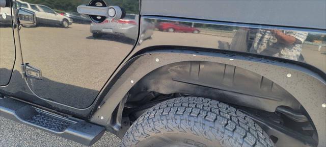 used 2011 Jeep Wrangler Unlimited car, priced at $12,950