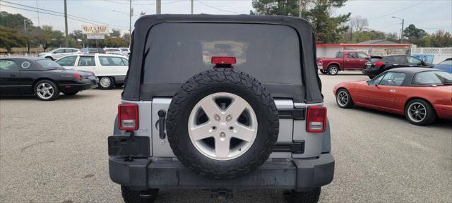 used 2015 Jeep Wrangler car, priced at $13,950