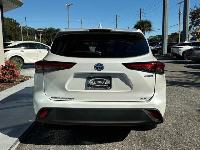 used 2022 Toyota Highlander Hybrid car, priced at $31,495