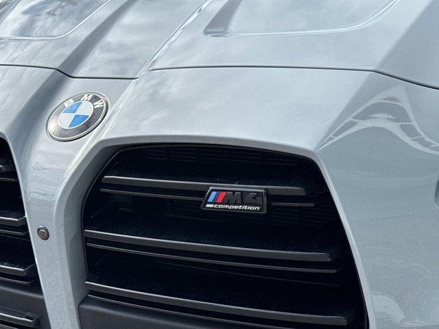 used 2024 BMW M4 car, priced at $66,995