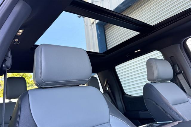 new 2025 Ford F-150 Lightning car, priced at $77,465