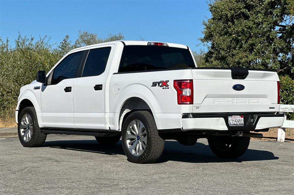 used 2018 Ford F-150 car, priced at $23,305
