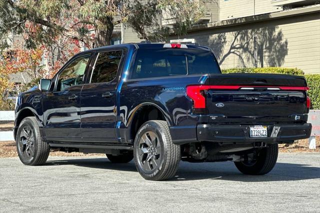 used 2023 Ford F-150 Lightning car, priced at $59,272