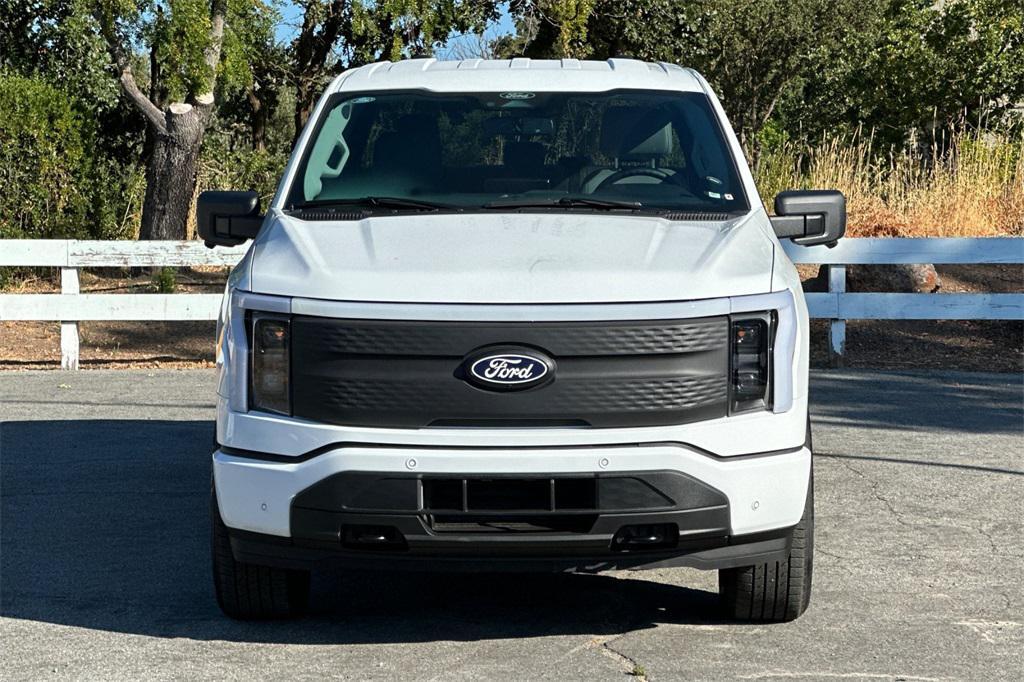 new 2025 Ford F-150 Lightning car, priced at $70,990