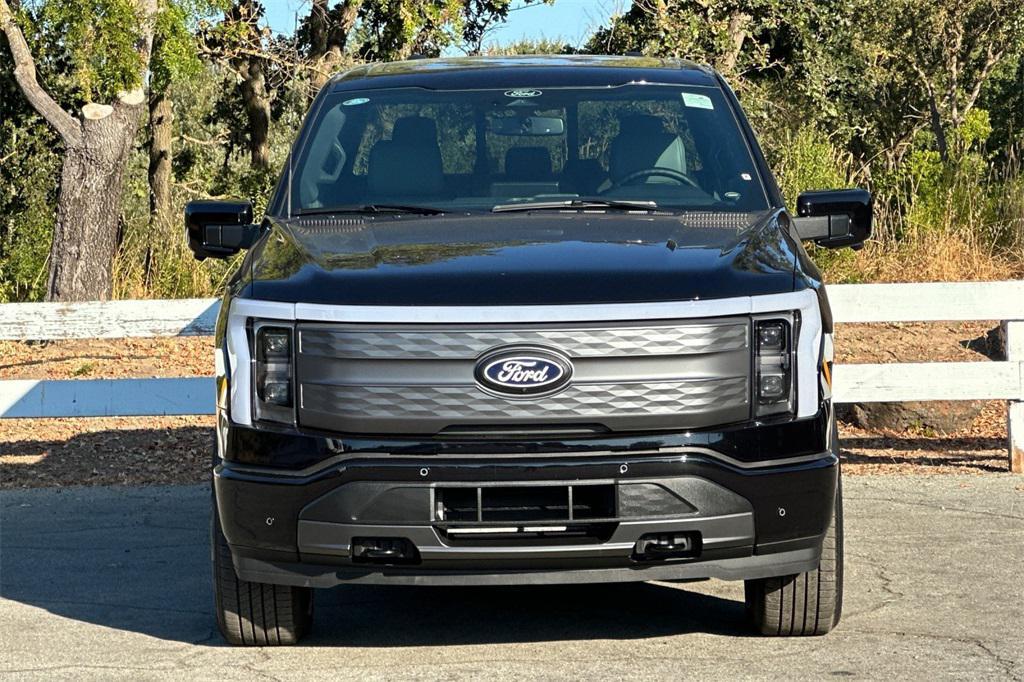 new 2025 Ford F-150 Lightning car, priced at $77,965