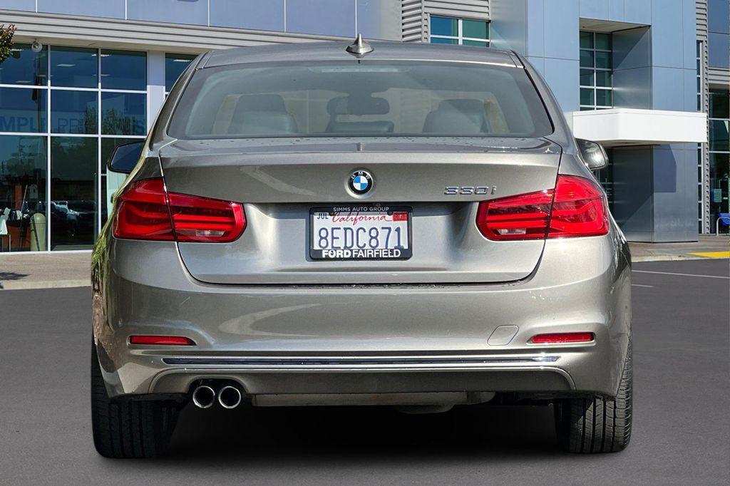 used 2018 BMW 330 car, priced at $20,591