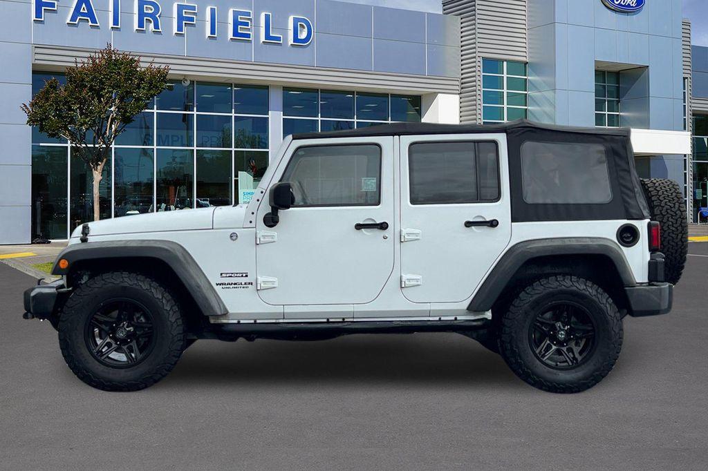 used 2012 Jeep Wrangler Unlimited car, priced at $14,991