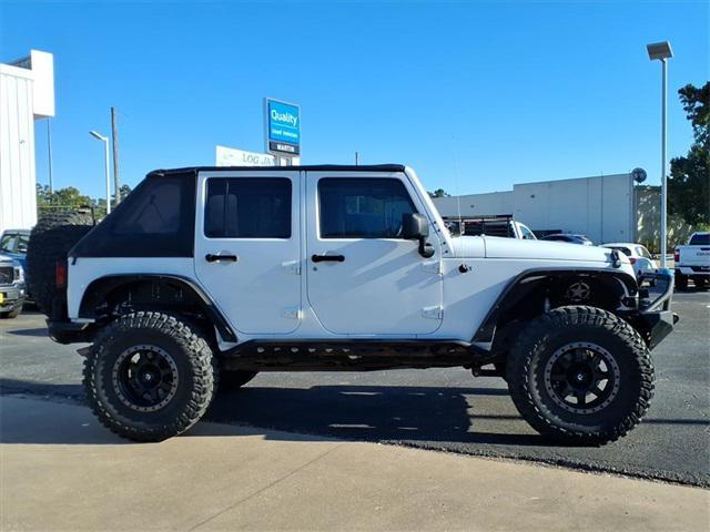 used 2013 Jeep Wrangler Unlimited car, priced at $14,847
