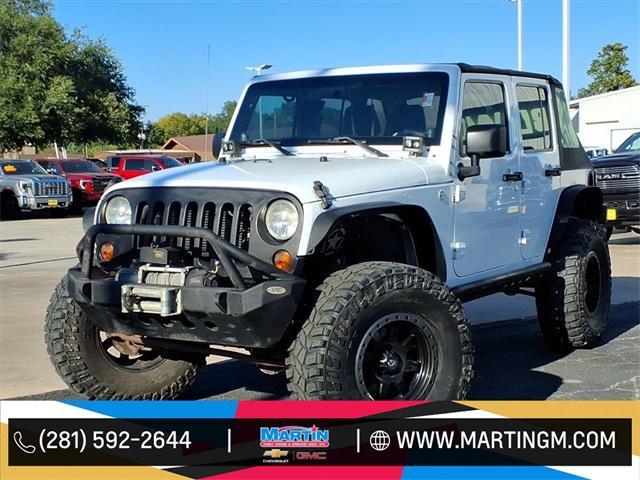 used 2013 Jeep Wrangler Unlimited car, priced at $14,847