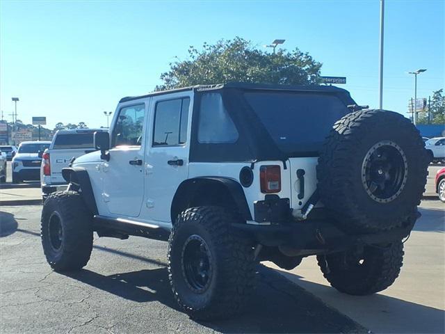 used 2013 Jeep Wrangler Unlimited car, priced at $14,847