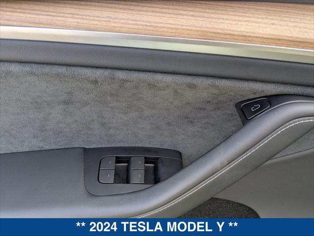 used 2024 Tesla Model Y car, priced at $35,700