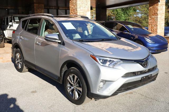 used 2018 Toyota RAV4 car, priced at $19,797