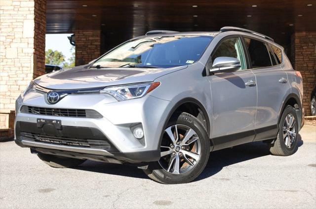 used 2018 Toyota RAV4 car, priced at $19,797