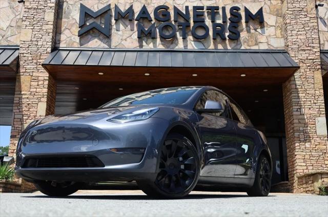 used 2022 Tesla Model Y car, priced at $27,997