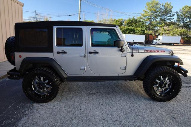 used 2014 Jeep Wrangler Unlimited car, priced at $18,997