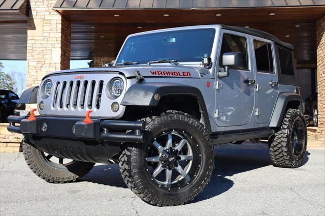 used 2014 Jeep Wrangler Unlimited car, priced at $18,997