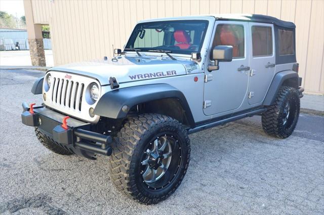 used 2014 Jeep Wrangler Unlimited car, priced at $18,997