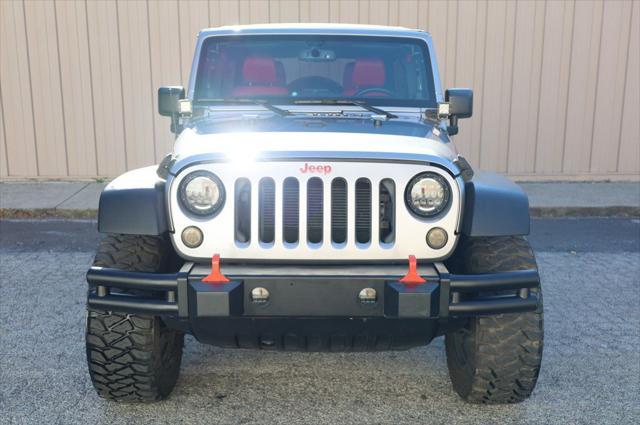 used 2014 Jeep Wrangler Unlimited car, priced at $18,997