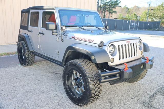 used 2014 Jeep Wrangler Unlimited car, priced at $18,997