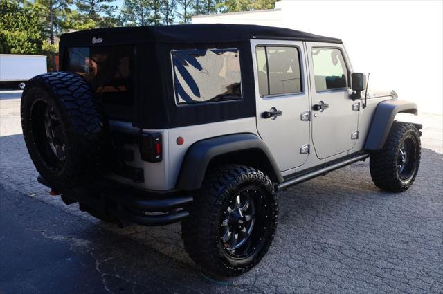 used 2014 Jeep Wrangler Unlimited car, priced at $18,997