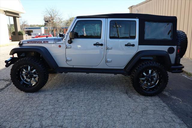 used 2014 Jeep Wrangler Unlimited car, priced at $18,997