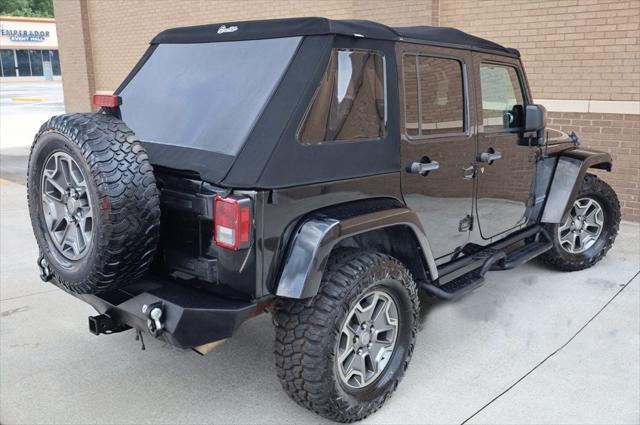 used 2014 Jeep Wrangler Unlimited car, priced at $17,997