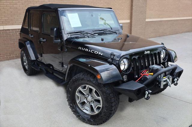 used 2014 Jeep Wrangler Unlimited car, priced at $17,997