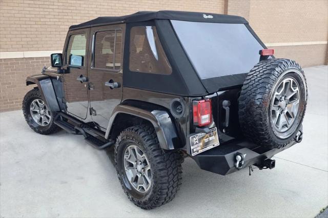 used 2014 Jeep Wrangler Unlimited car, priced at $17,997