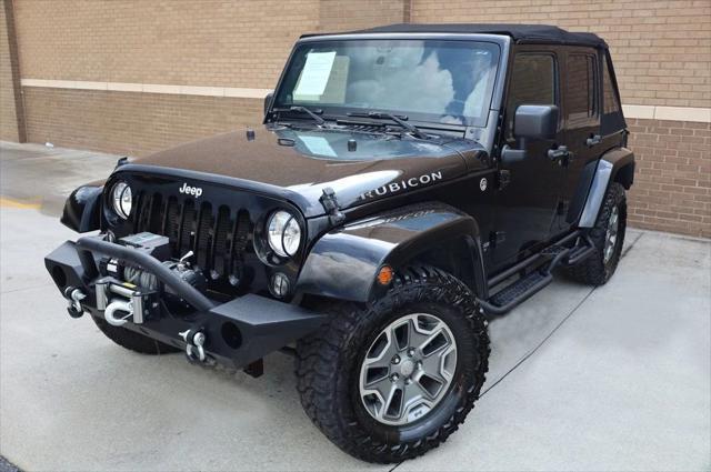 used 2014 Jeep Wrangler Unlimited car, priced at $17,997