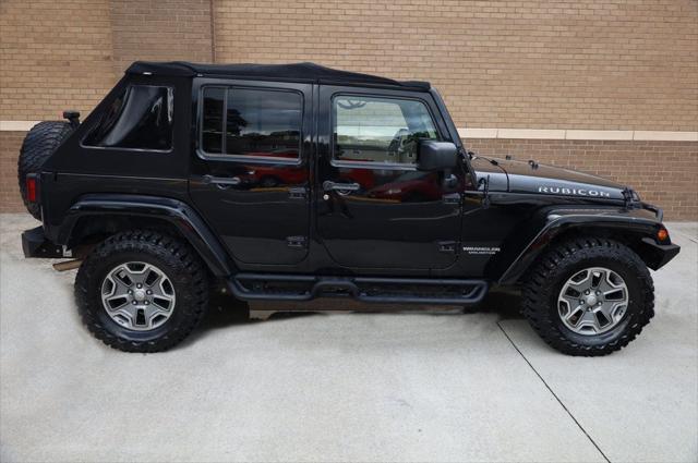 used 2014 Jeep Wrangler Unlimited car, priced at $17,997
