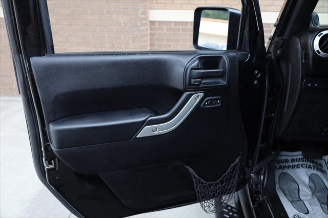 used 2014 Jeep Wrangler Unlimited car, priced at $17,997
