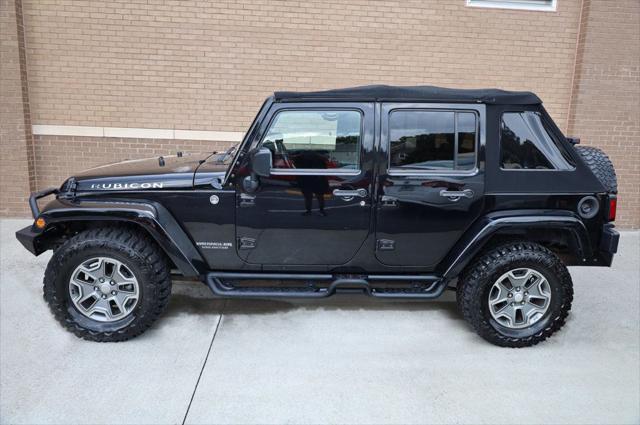 used 2014 Jeep Wrangler Unlimited car, priced at $17,997