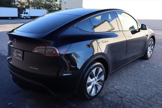 used 2022 Tesla Model Y car, priced at $27,497