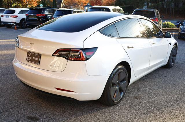 used 2022 Tesla Model 3 car, priced at $27,497