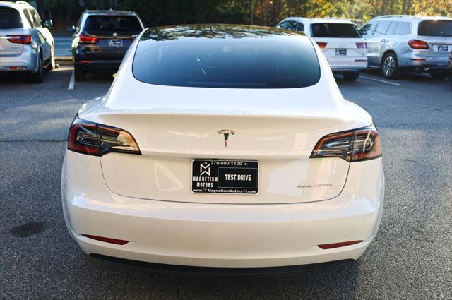 used 2022 Tesla Model 3 car, priced at $27,497