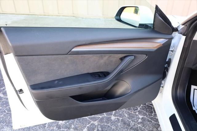 used 2022 Tesla Model 3 car, priced at $20,297