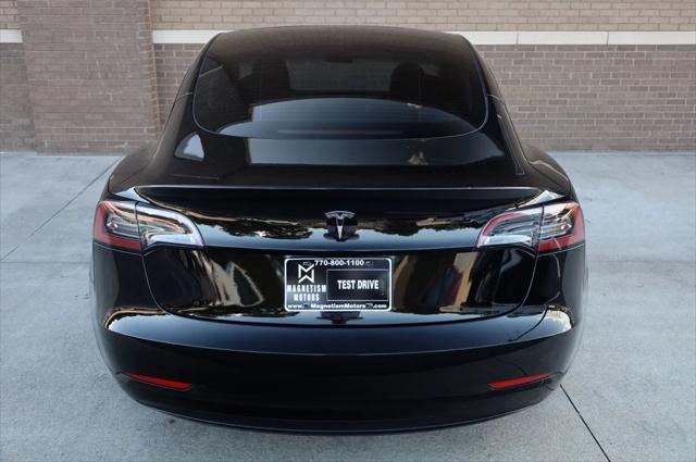 used 2023 Tesla Model 3 car, priced at $20,297